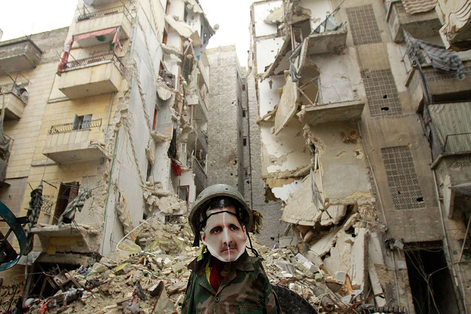 A dummy dressed up in army fatigue and a mask depicting Syrian President Bashar al-Assad is erected in the Salaheddine neighborhood of Aleppo, the scene of heavy fighting. Saudi Arabia and Egypt called for a peaceful solution to the conflict roiling Syria, but said the terms of a settlement to end the bloodshed there must be defined by the Syrian people.