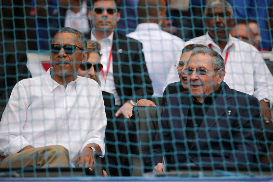 HAVANA, CUBA - MARCH 22: U.S. President Barack Obama (L) and Cuban President Raul Castro talk before the start of an exposition game between the Cuban national team and the Major League Baseball team Tampa Bay Devil Rays at the Estado Latinoamericano March 22, 2016 in Havana, Cuba. This is the first time a sittng president has visited Cuba in 88 years. (Photo by Chip Somodevilla/Getty Images)