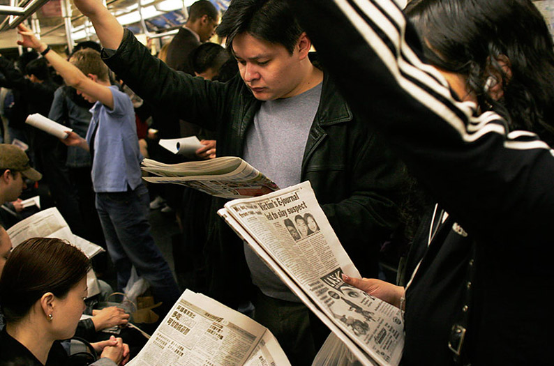nyc_subway_riders_with_their_newspapers-travis-ruse
